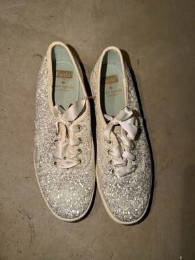 kate spade Glitter Ribbon Lace Sneakers in Silver and Cream